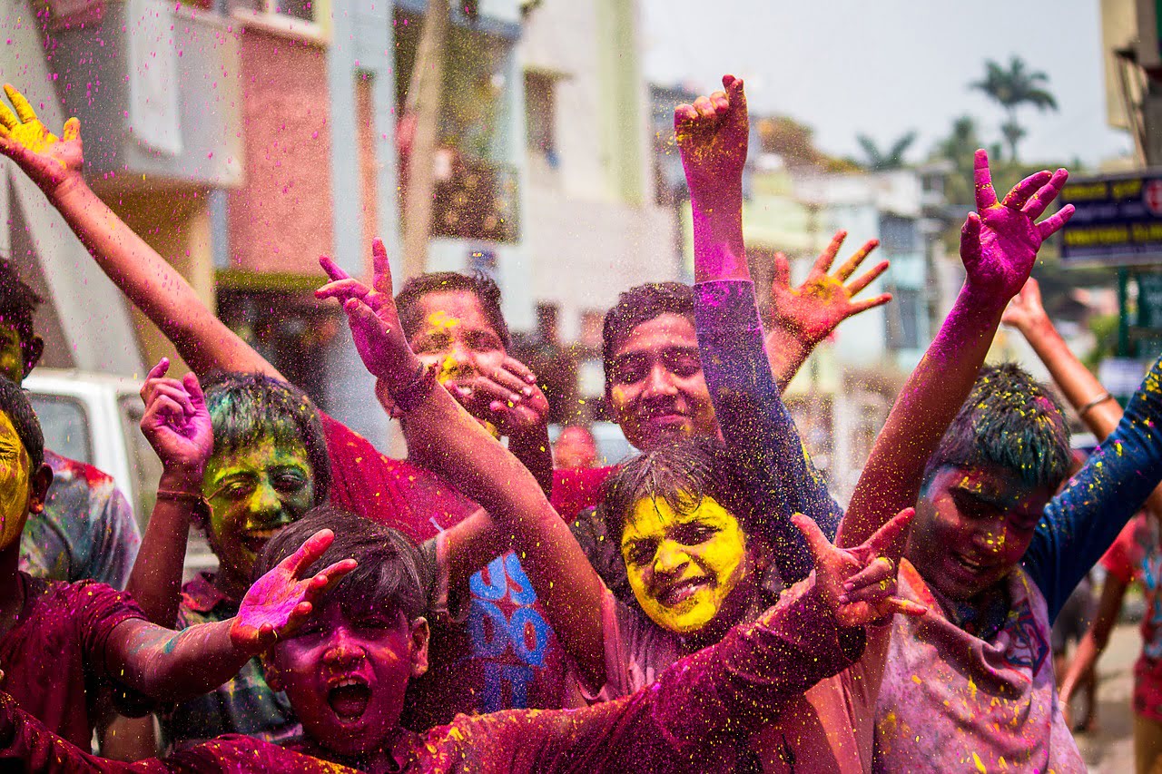 children celebrating holi colour festival